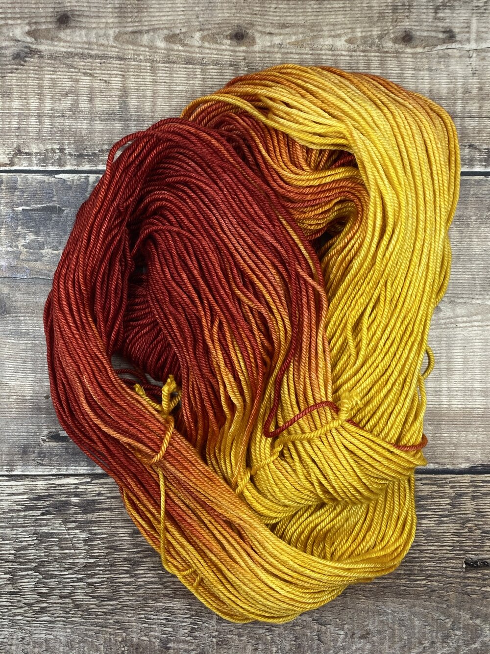 yellow orange and red silk merino wool hand dyed yarn