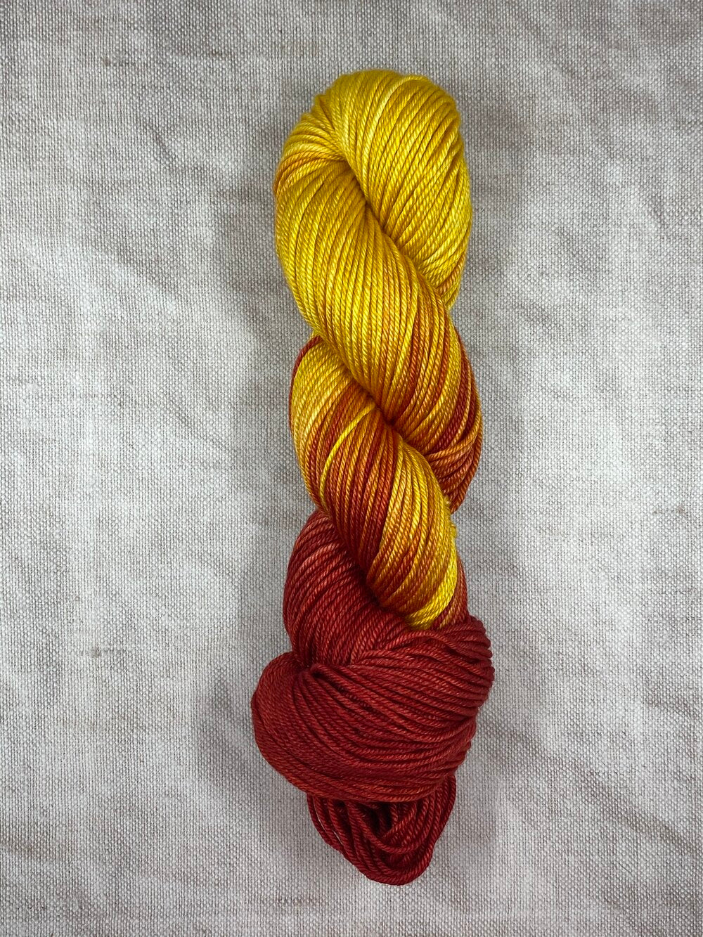yellow orange and red silk merino wool hand dyed yarn